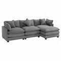 Divano modulare in tessuto con chaise longue